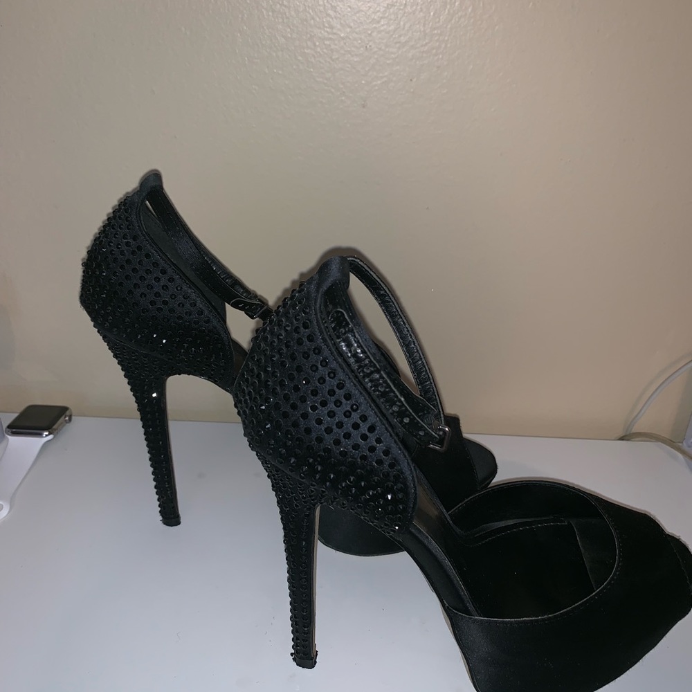 Black high heel platform shoe